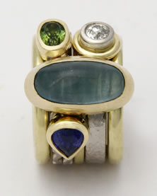 'Stacking Ring multi-stone' in 18K gold with Aqua, blue Sapphire, diamond and green tourmaline